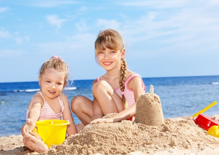 Little girl  playing on  beach.の写真素材