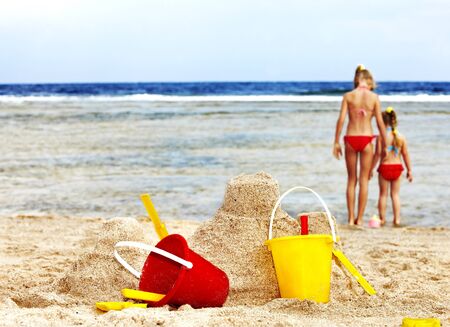 Little girl  playing on  beach.の写真素材