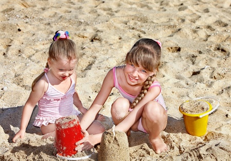 Little girl  playing in sand.の写真素材