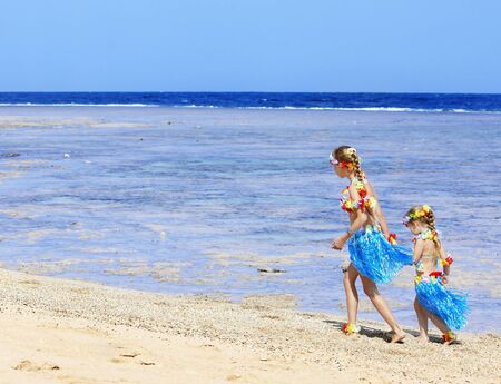 Little girl  playing on  Hawaii beach .の写真素材
