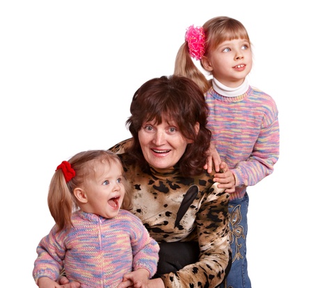 Happy grandmother and two granddaughter. Isolated.の写真素材