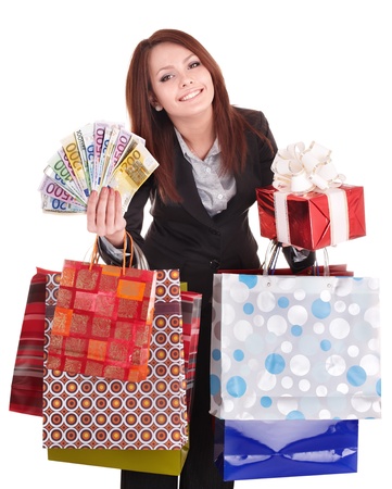 Woman holding money, gift box and shopping bag. Isolated.の写真素材