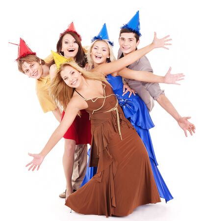 Group of young people in party hat holding balloon. Isolated.の写真素材