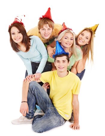 Group of young people in party hat . Isolated.の写真素材