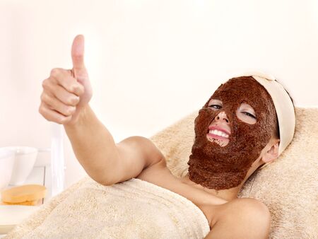 Young womanl with algae facial mask.の写真素材