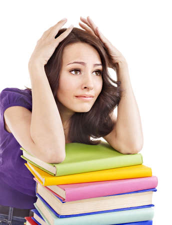 Girl with pile color book . Isolated.の写真素材