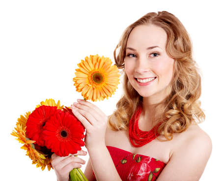 Happy young woman holding bunch of flowers.の写真素材