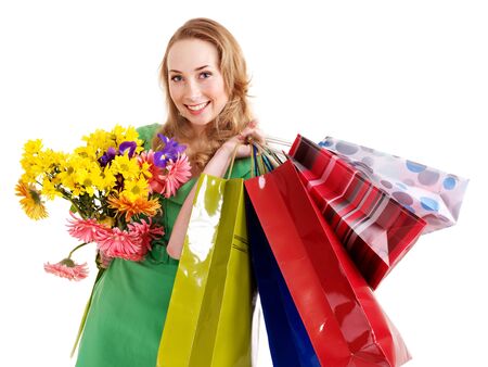 Happy young woman with shopping bag. Isolated.の写真素材