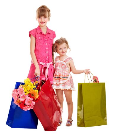 Happy little girl with shopping bag. Isolated.の写真素材
