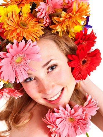 Young woman with flower wreath. Spring hairstyle.の写真素材