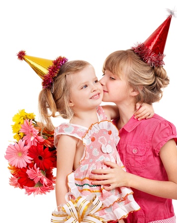 Little girl in party hat with stack gift box. Isolated.の写真素材