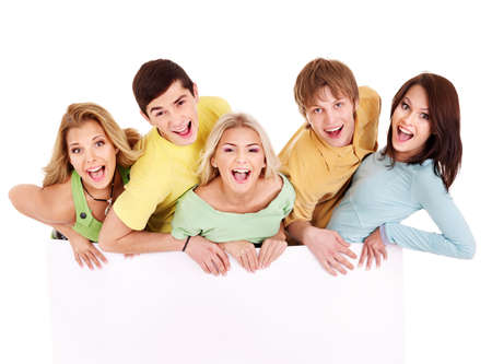 Group of happy people holding banner. Isolated.の写真素材