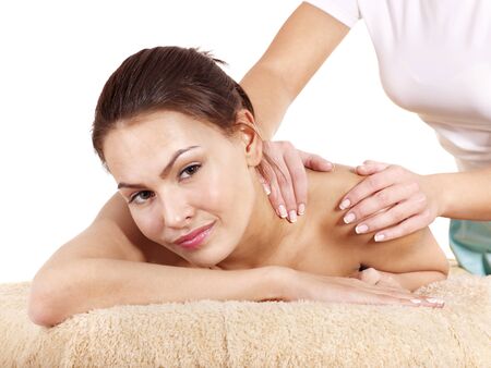 Young woman having classical massage in beauty spa. Series.の写真素材