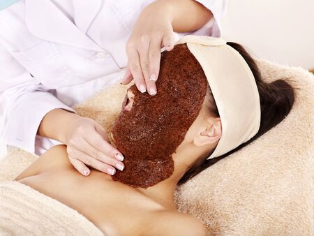 Young womanl with algae facial mask.の写真素材