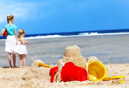 Little girl  playing on  beach.の写真素材