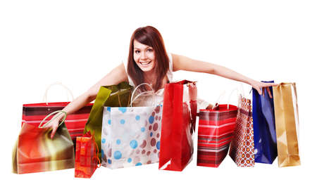 Young girl with shopping  bag. Isolated.の写真素材
