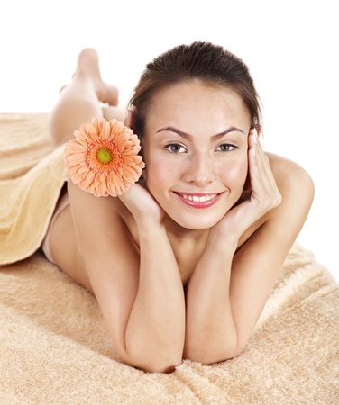 Young beautiful woman on massage table in beauty spa. Series.の写真素材