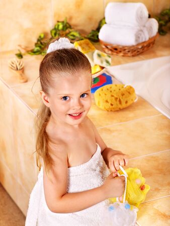 Child washing in bubble bath .の写真素材
