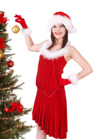 Girl in santa hat holding  christmas ball.  Isolated.の写真素材