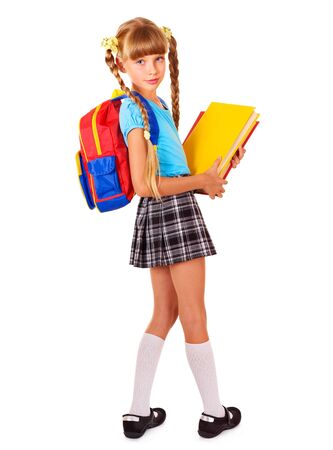 Schoolgirl with backpack holding books. Isolated.の写真素材