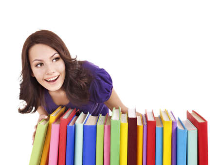 Girl with pile color book . Isolated.の写真素材