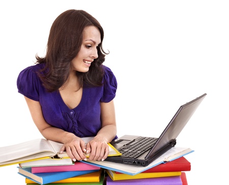 Girl with stack color book  and laptop.. Isolated.の写真素材