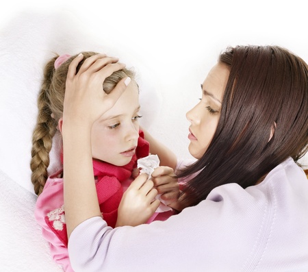 Sick little girl with mother. Isolated.の写真素材