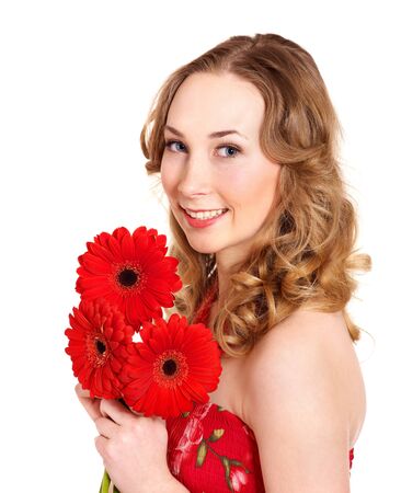 Happy young woman holding red flowers.の写真素材