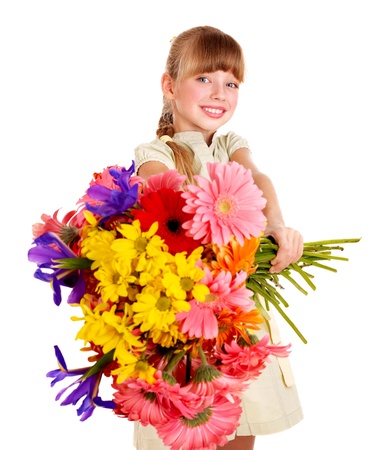 Happy little girl giving bunch of flowers.の写真素材