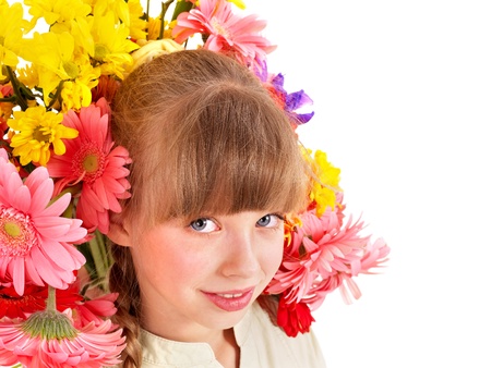 Little cute girl with flower wreath. Spring hairstyle.の写真素材