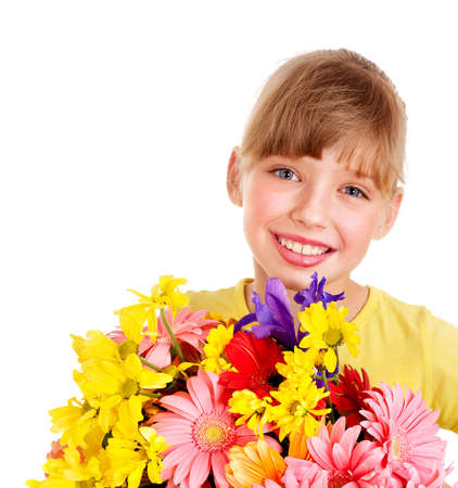 Happy little girl holding bunch of flowers.の写真素材