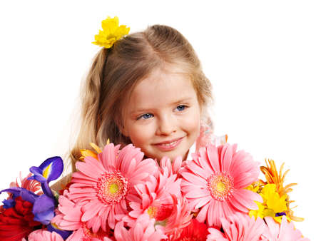 Happy little girl holding bunch of flowers.の写真素材