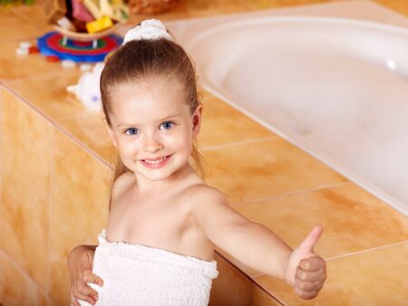 Child washing in bubble bath .の写真素材