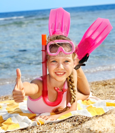 Little girl  playing on  beach.の写真素材