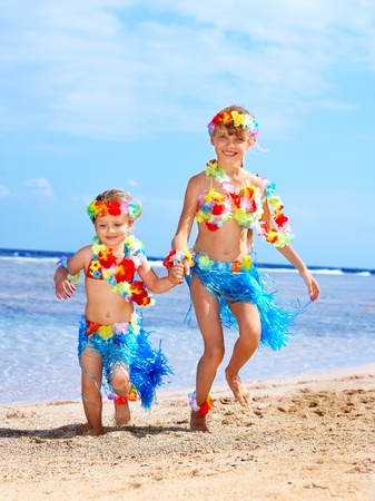 Little girl  playing on  Hawaii beach .の写真素材