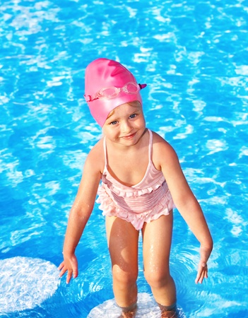 Little girl  swimming in pool.の写真素材