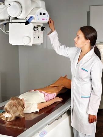 Little girl with doctor radiologist.の写真素材