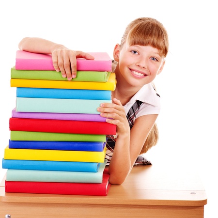 School girl holding stack of books. Isolated.の写真素材