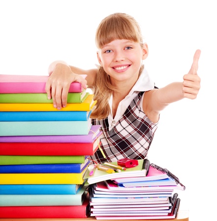 Schoolgirl with stack of books and showing thumb up. Isolated.の写真素材