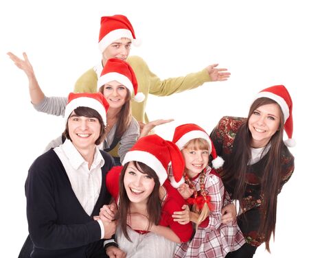  Happy group people with children in santa hat .  Isolated.の写真素材