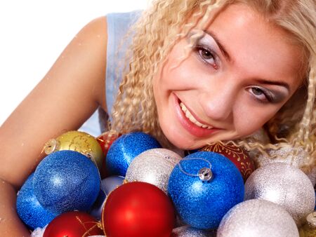 Young beautiful woman in christmas balls.の写真素材