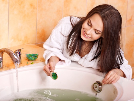 Young woman take bubble  bath.の写真素材