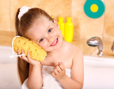 Child washing in bubble bath .の写真素材