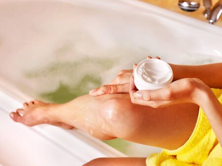 Young woman take bubble  bath.の写真素材
