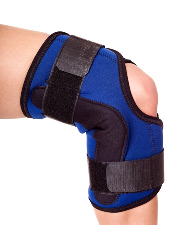 Trauma of knee in brace. Isolated.の写真素材