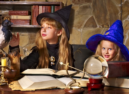 Witch  children with crystal ball. Halloween.の写真素材