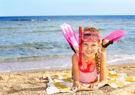 Little girl  playing on  beach.の写真素材