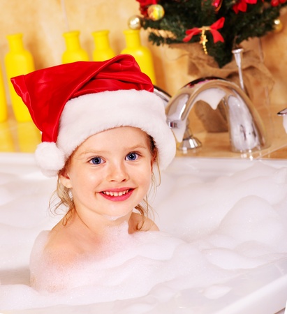 Child washing in bubble bath .の写真素材