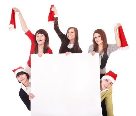 Happy group  people  in santa hat whith banner. Isolated.の写真素材
