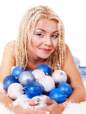 Young woman in christmas balls. Fashion studio shot"の写真素材